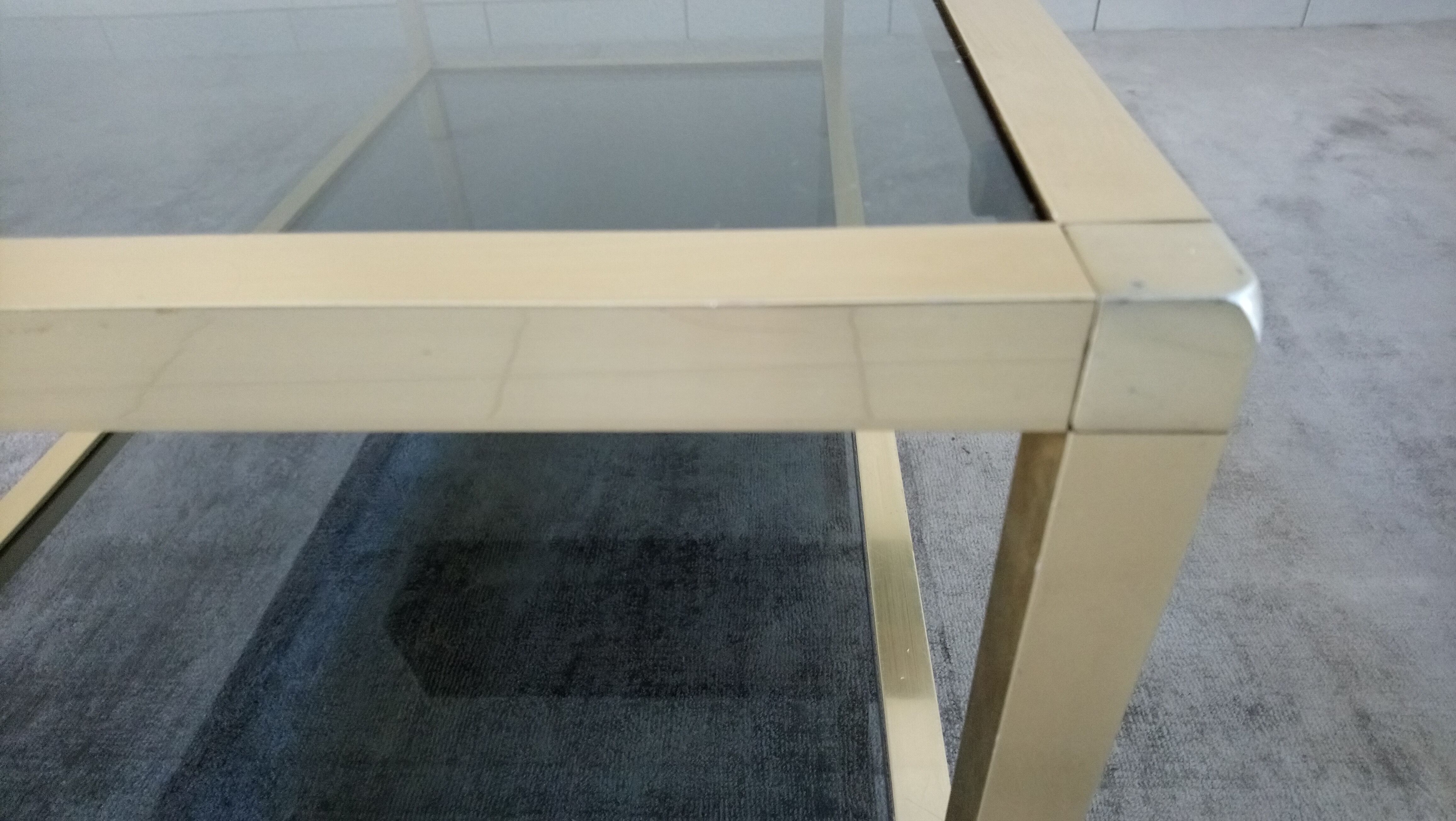 Table low brass and smoked glass 70s