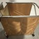 1970s/80s coffee table on casters with metal tubing, light-colored door