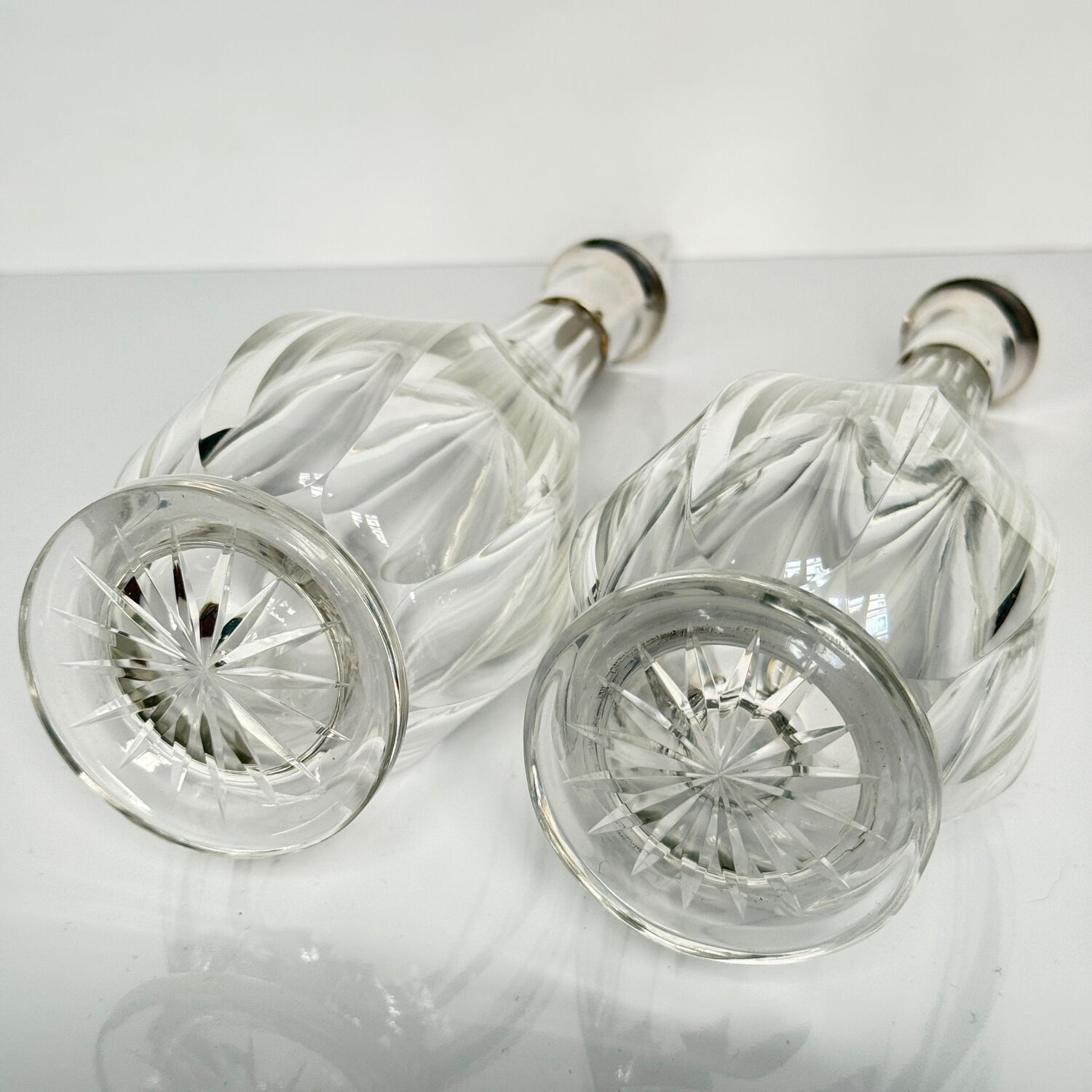 Pair of crystal decanters with solid silver mounts