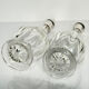 Pair of crystal decanters with solid silver mounts