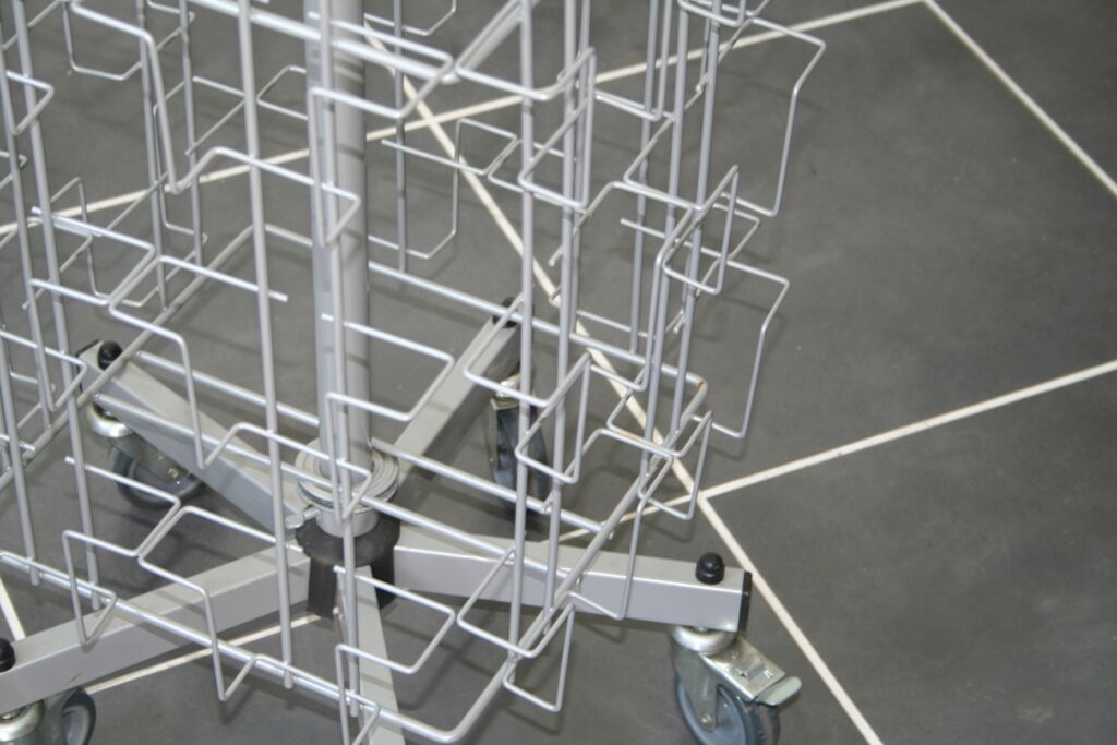Grey swivel postcard display on wheels
