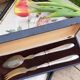 Corn and silver metal salad cutlery