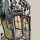 Black wrought iron lantern with stained glass. Medieval, Gothic decoration.