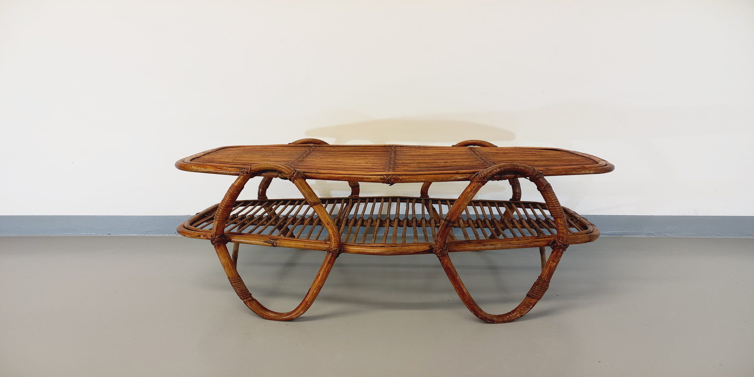 Coffee table with magazine tray in vintage rattan from the 60s