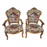 Pair of Louis XV style Baroque armchairs in gilded and carved wood circa 1900