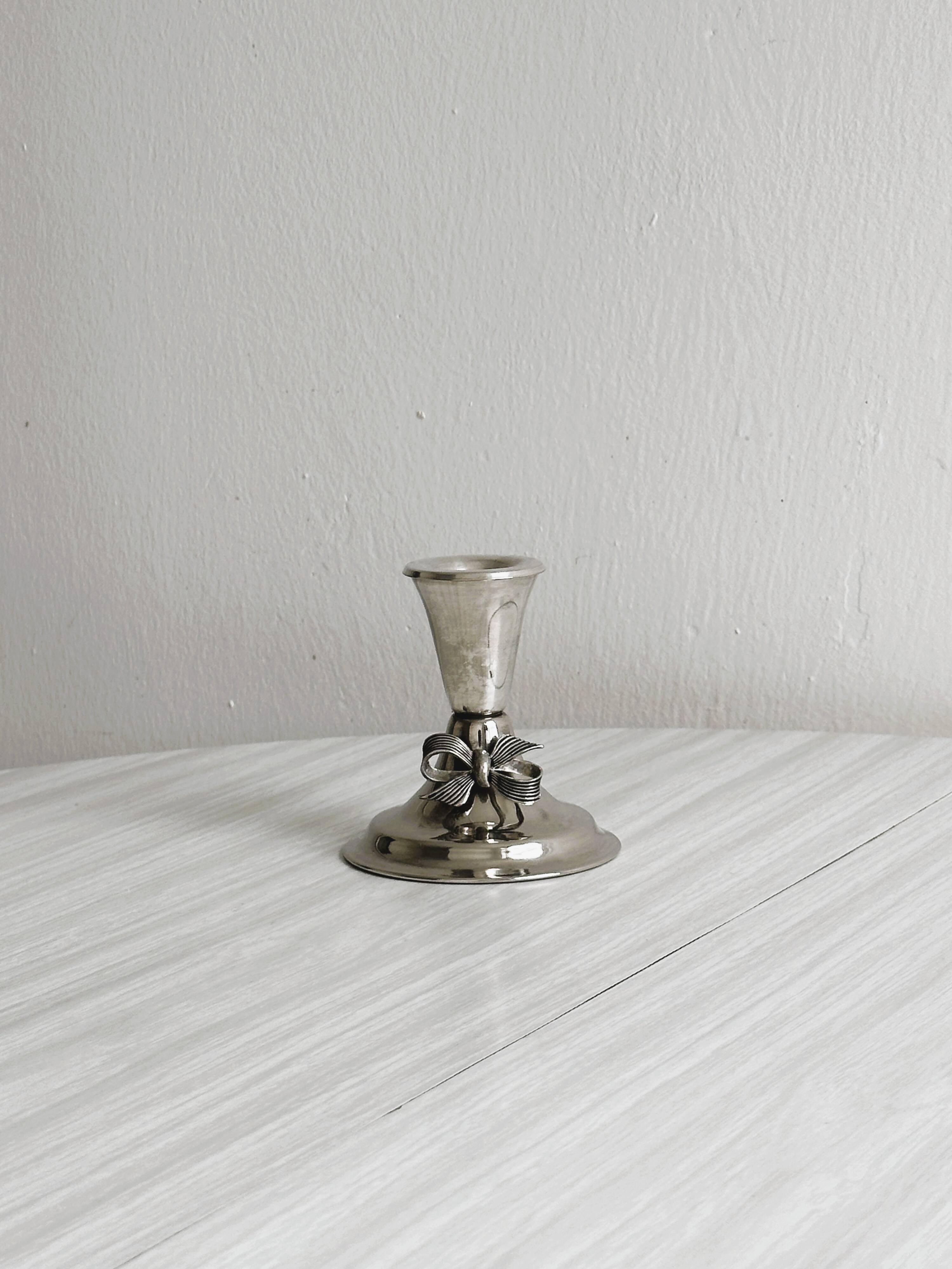 Vintage silver light metal candle holder