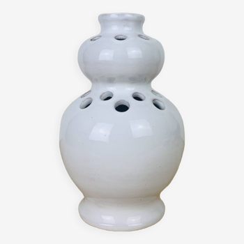 Vase with white ceramic flowers