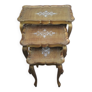 Set of three nesting tables in gilded wood in Florentine style Hollywo.
