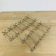 11 vintage metal knife holders