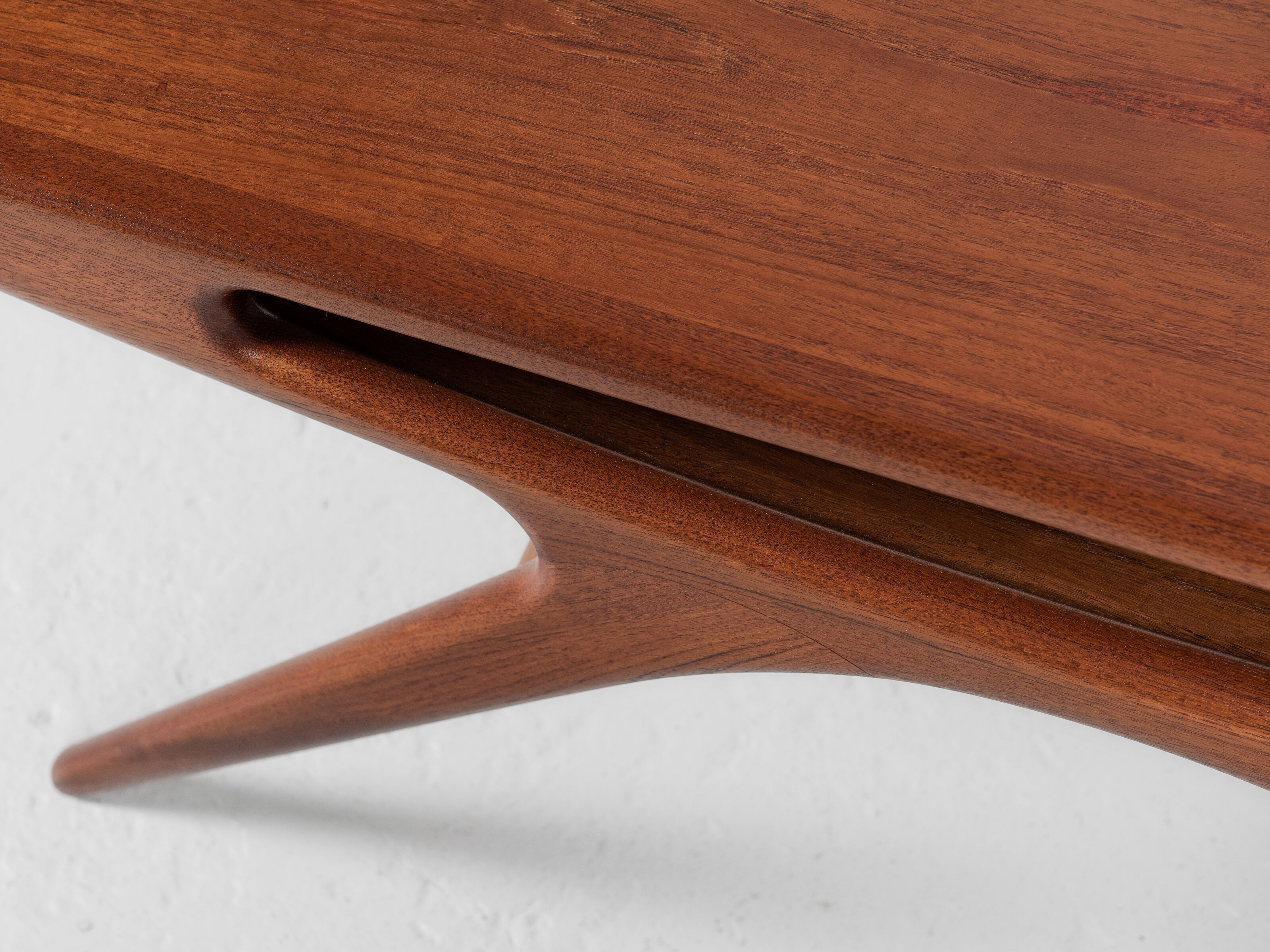 Midcentury danish smile coffee table in teak by johannes andersen for silkeborg 1950s