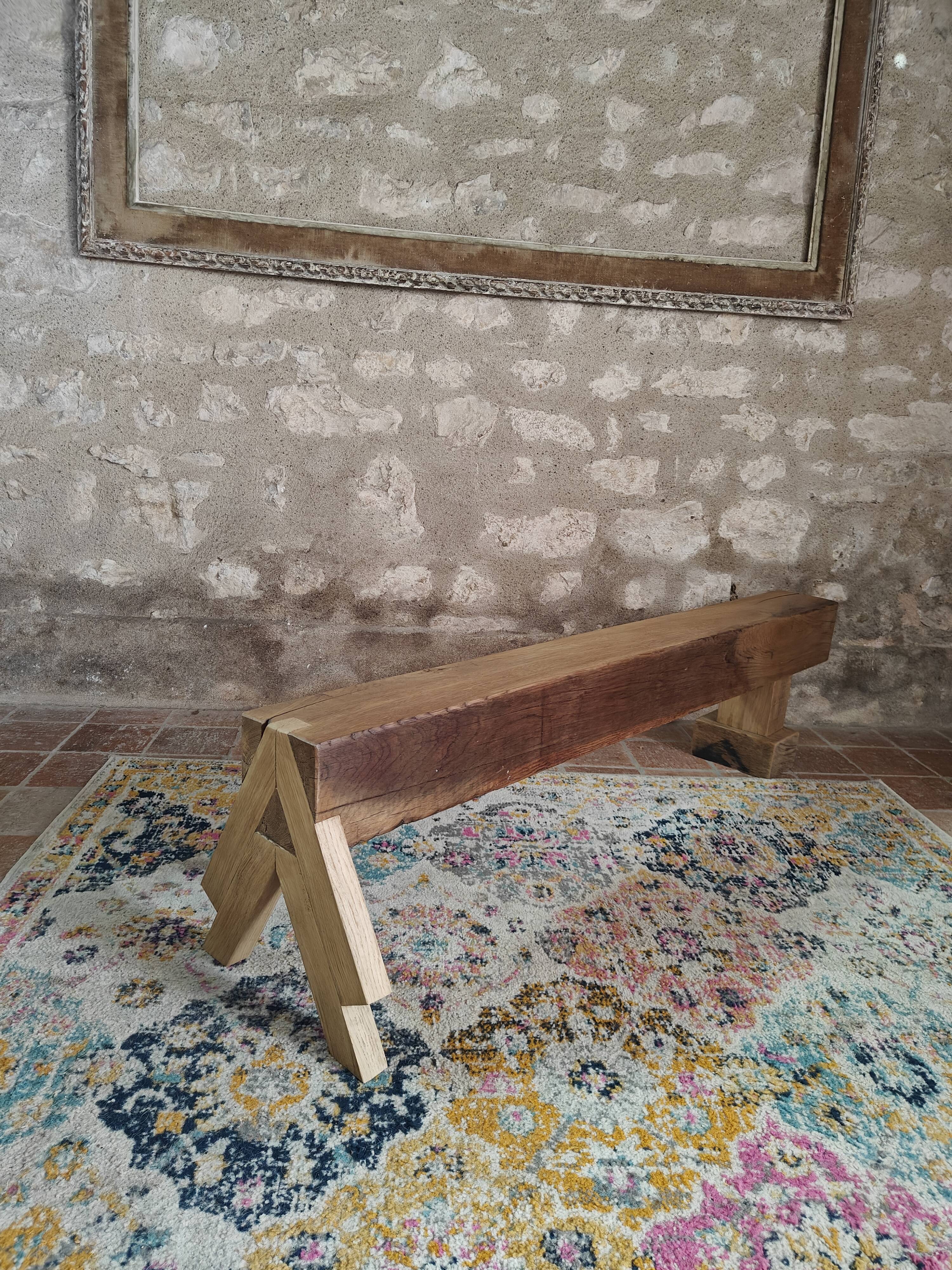 Solid oak bench with asymmetrical legs
