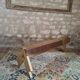 Solid oak bench with asymmetrical legs