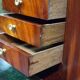 Rare four-column secretary from the Empire period in flame mahogany and bronze.