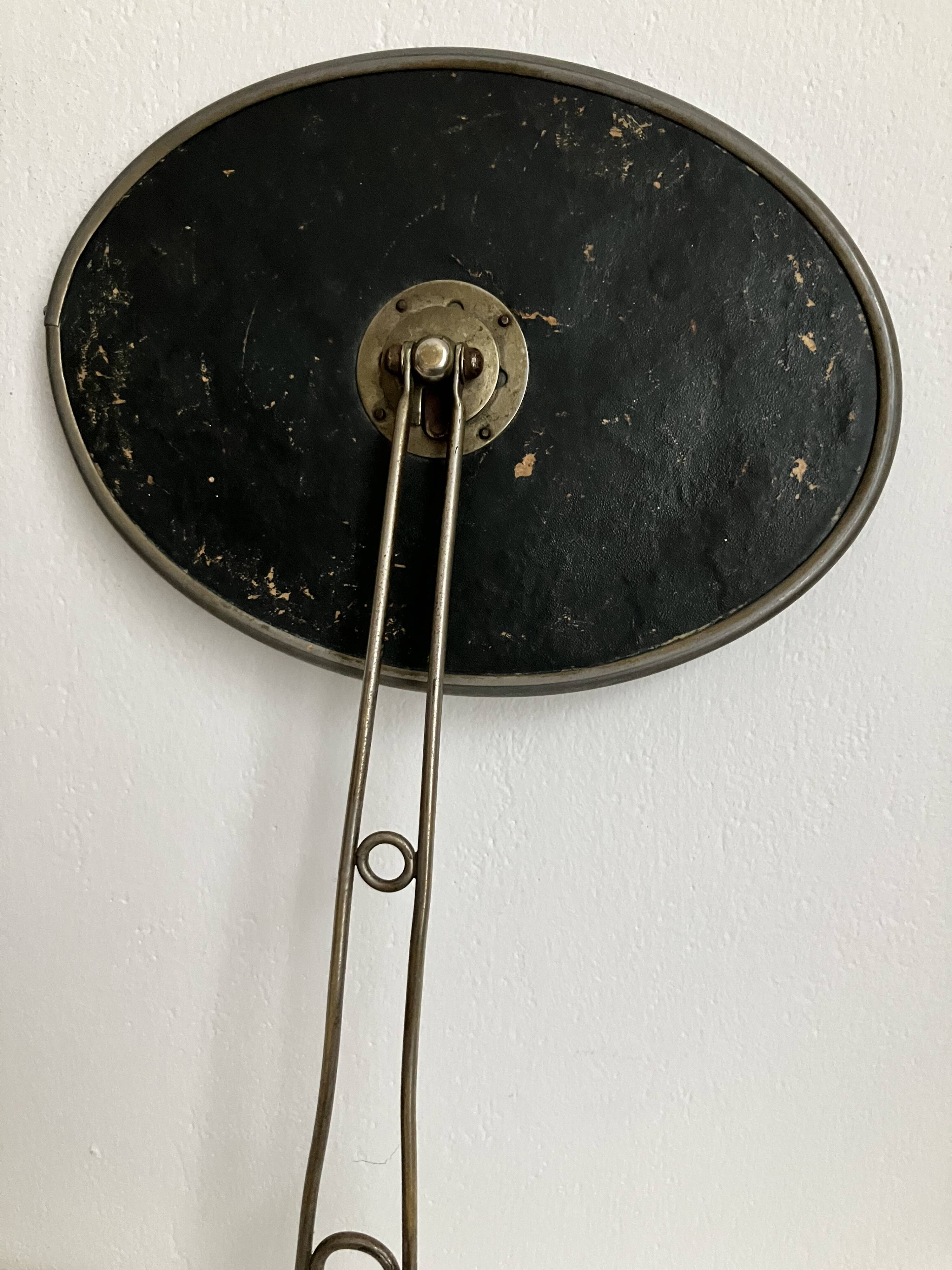 Early 20th century oval beveled mirror