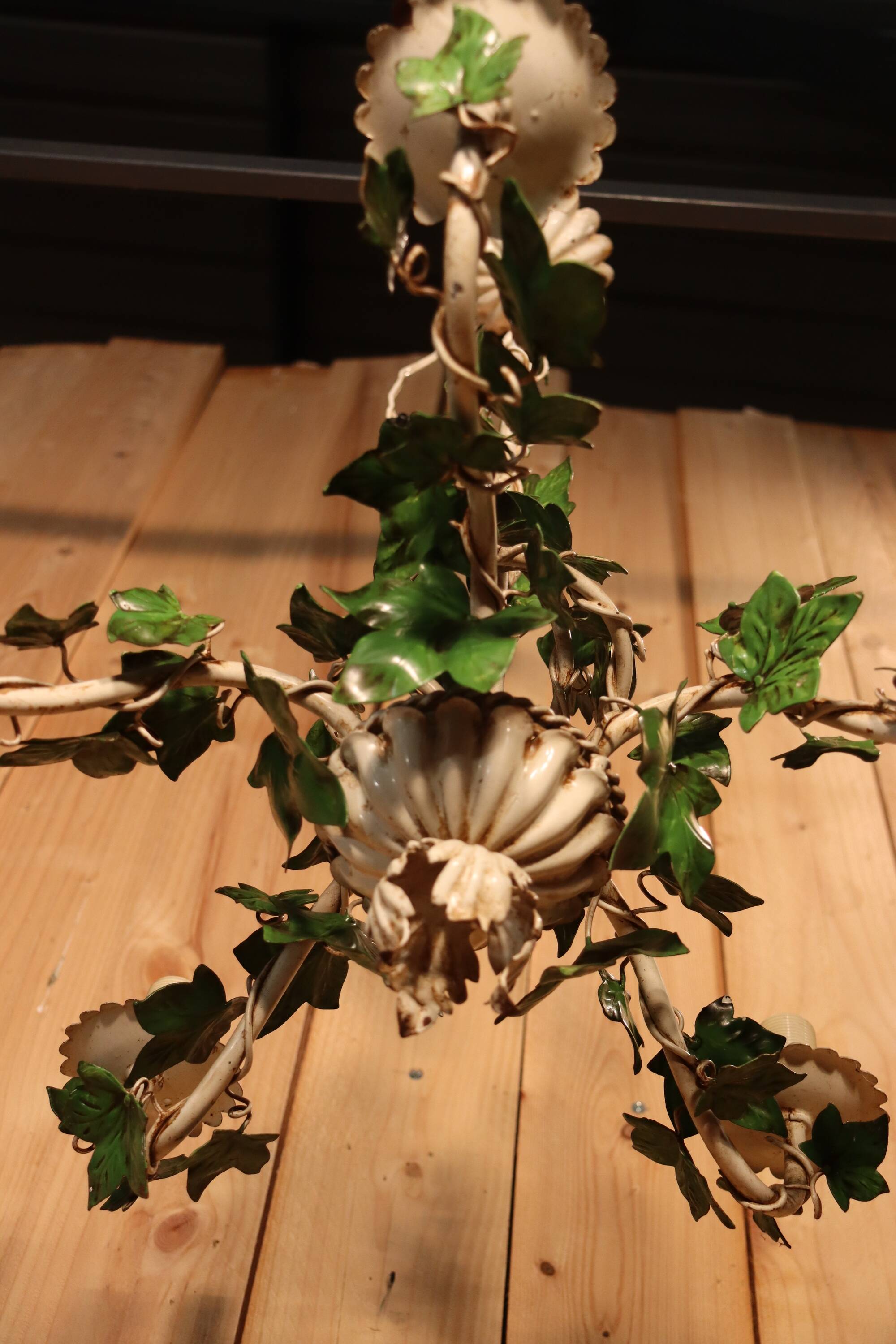 Antique metal chandelier with Art Nouveau floral decoration