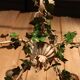 Antique metal chandelier with Art Nouveau floral decoration