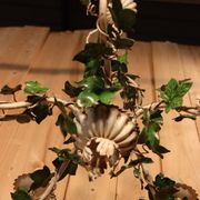 Antique metal chandelier with Art Nouveau floral decoration