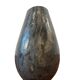 Vintage stone vase with worked fossil