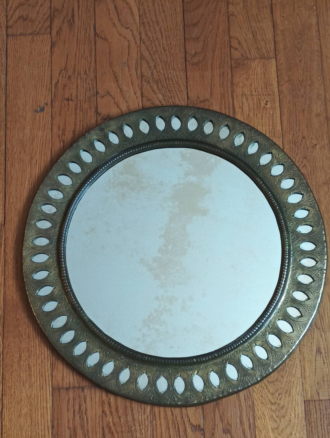 Oriental brass mirror