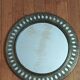 Oriental brass mirror