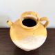 Yellow glazed jug