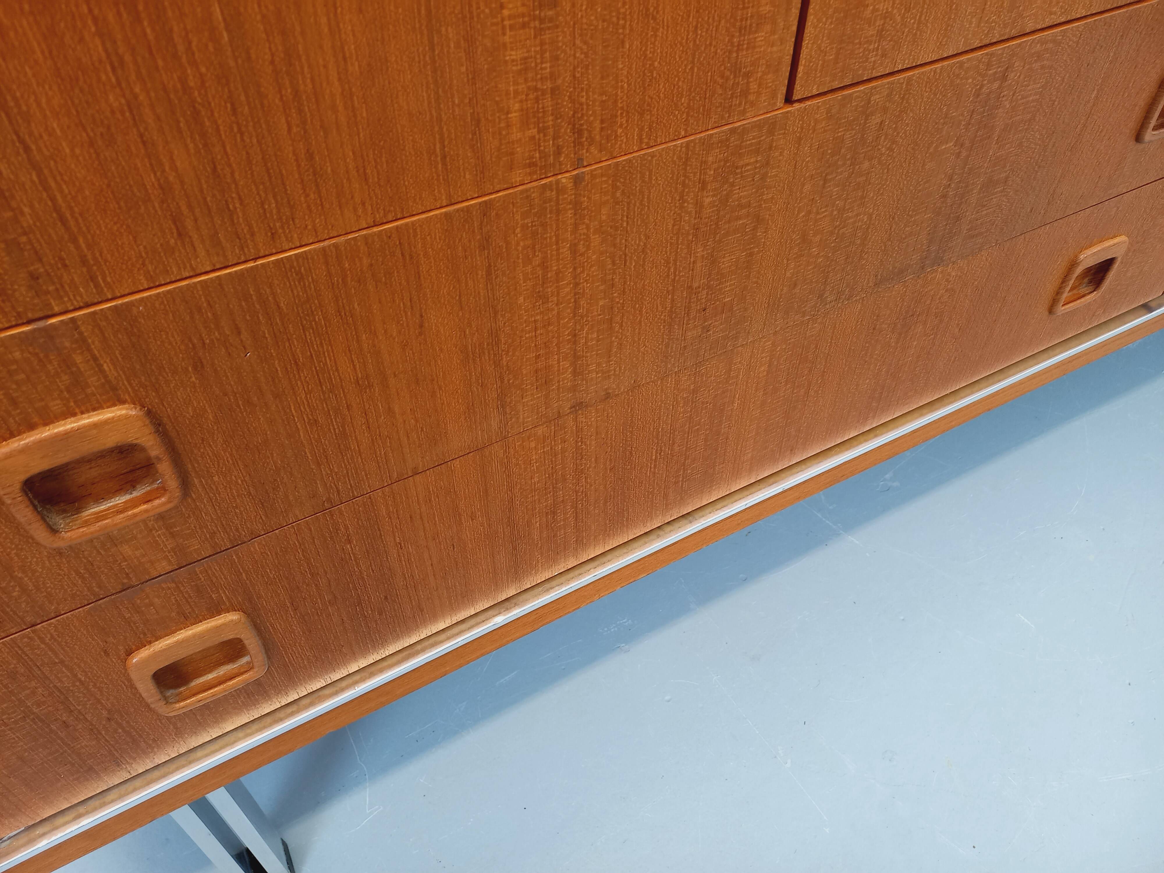 Vintage Scandinavian modernist wardrobe in teak and metal from the 1960s.