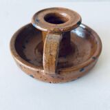 Signed sandstone candle holder