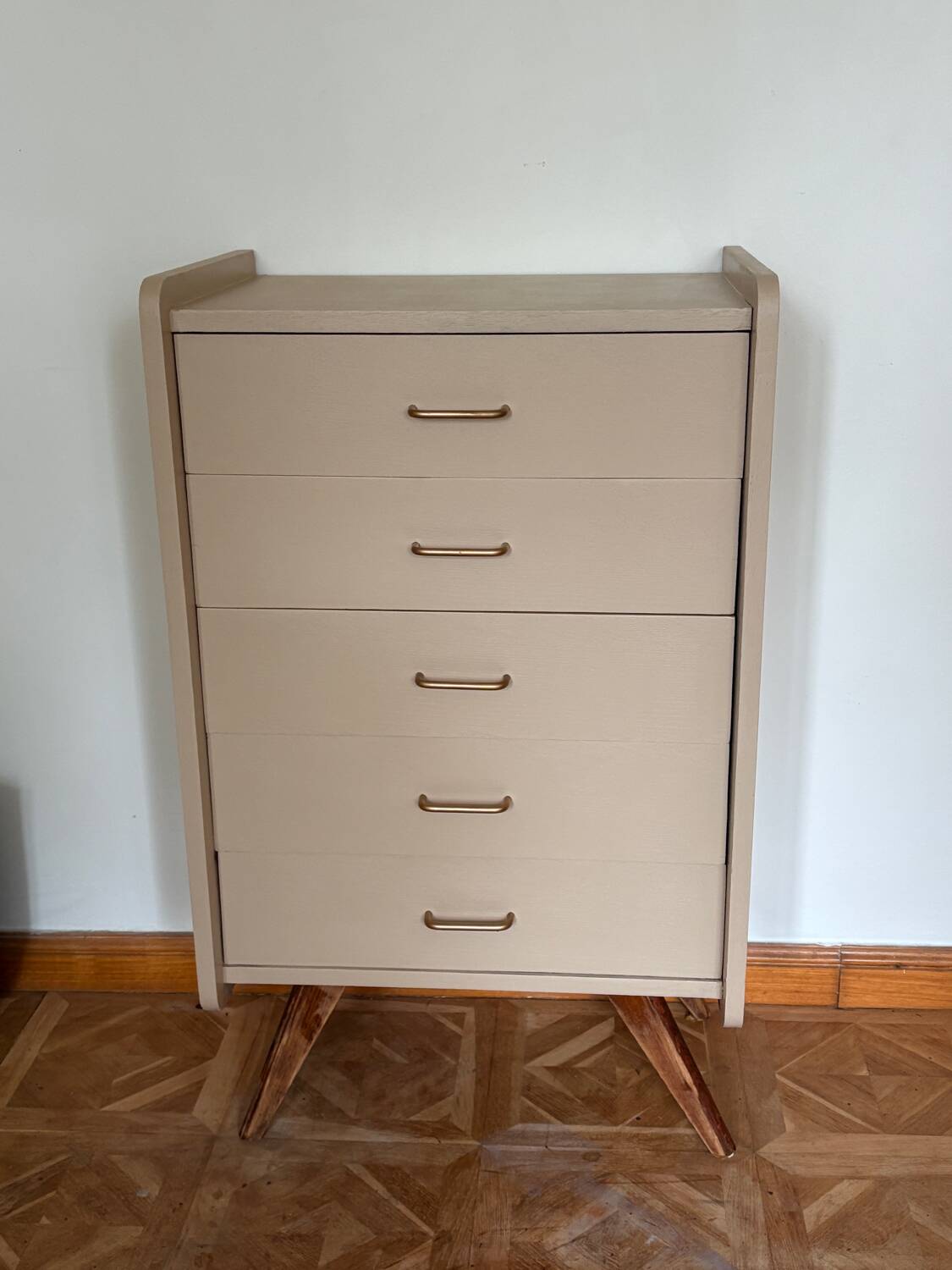 Mocha compass foot chest of drawers