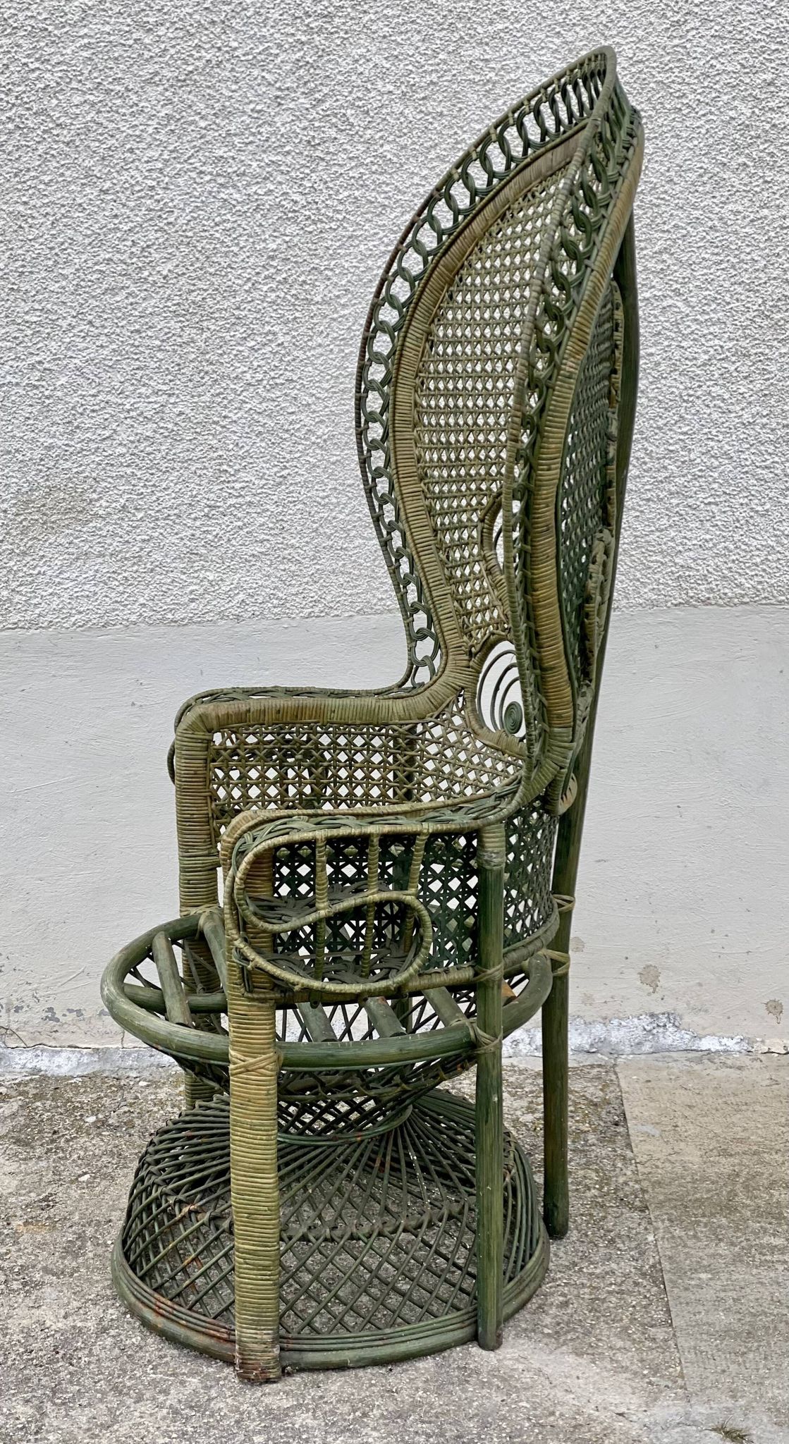 Vintage 1970s green patinated peacock rattan armchair