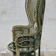Vintage 1970s green patinated peacock rattan armchair