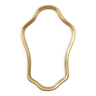Golden mirror in wood and gold leaf