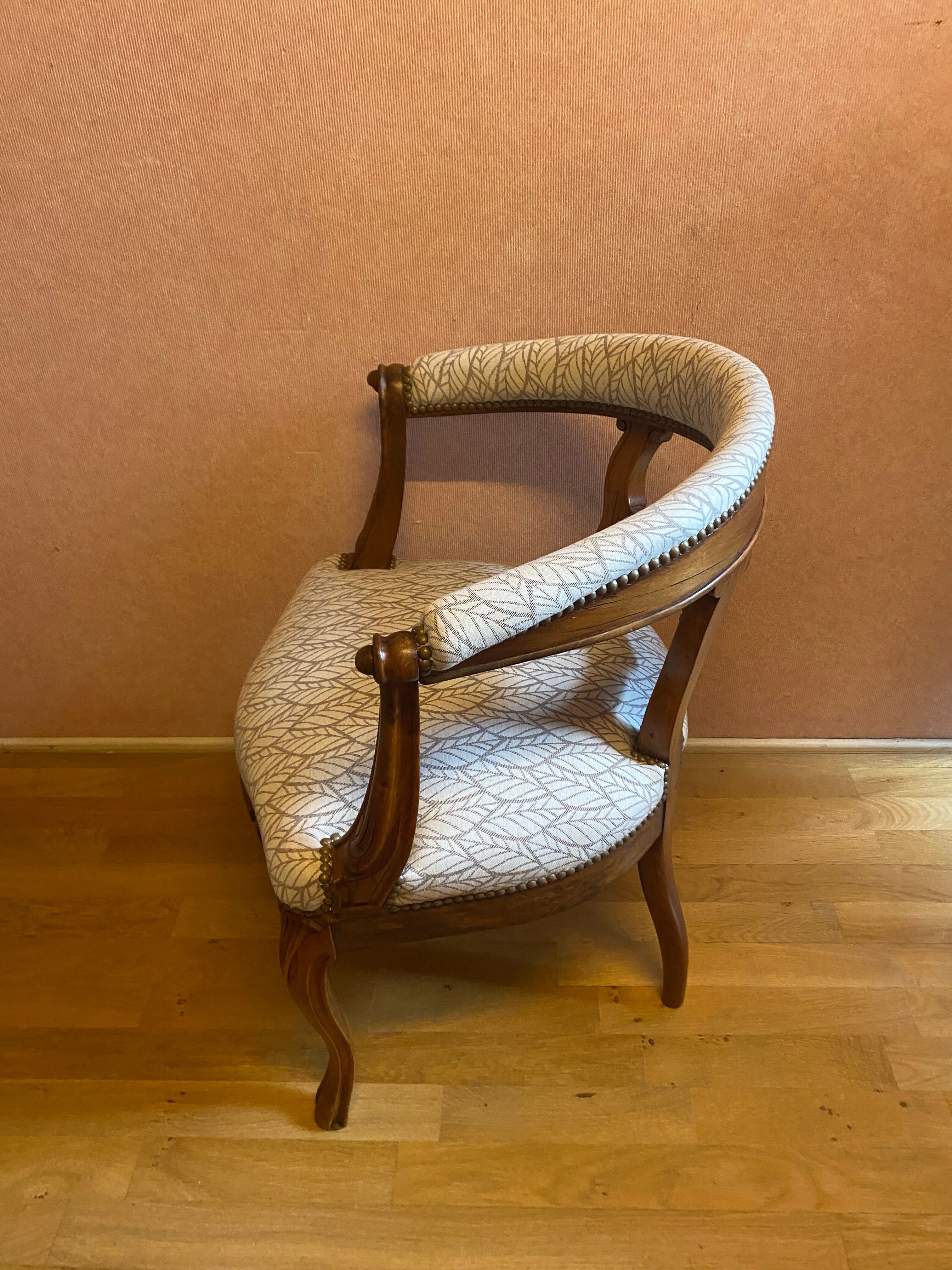 office armchair in walnut, nineteenth century, fully trimmed and reupholstered.