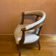 Fauteuil de bureau en noyer du XIX ème, entièrement garni et retapissé.
