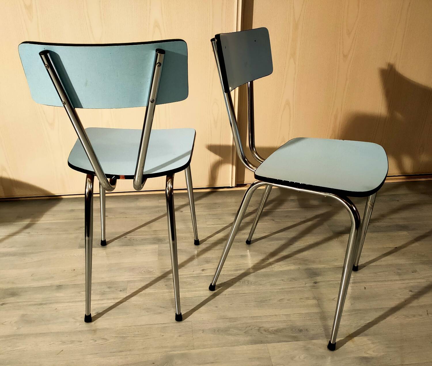 Pair of blue formica chairs