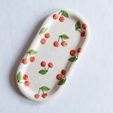 Old cake dish in cherry slip