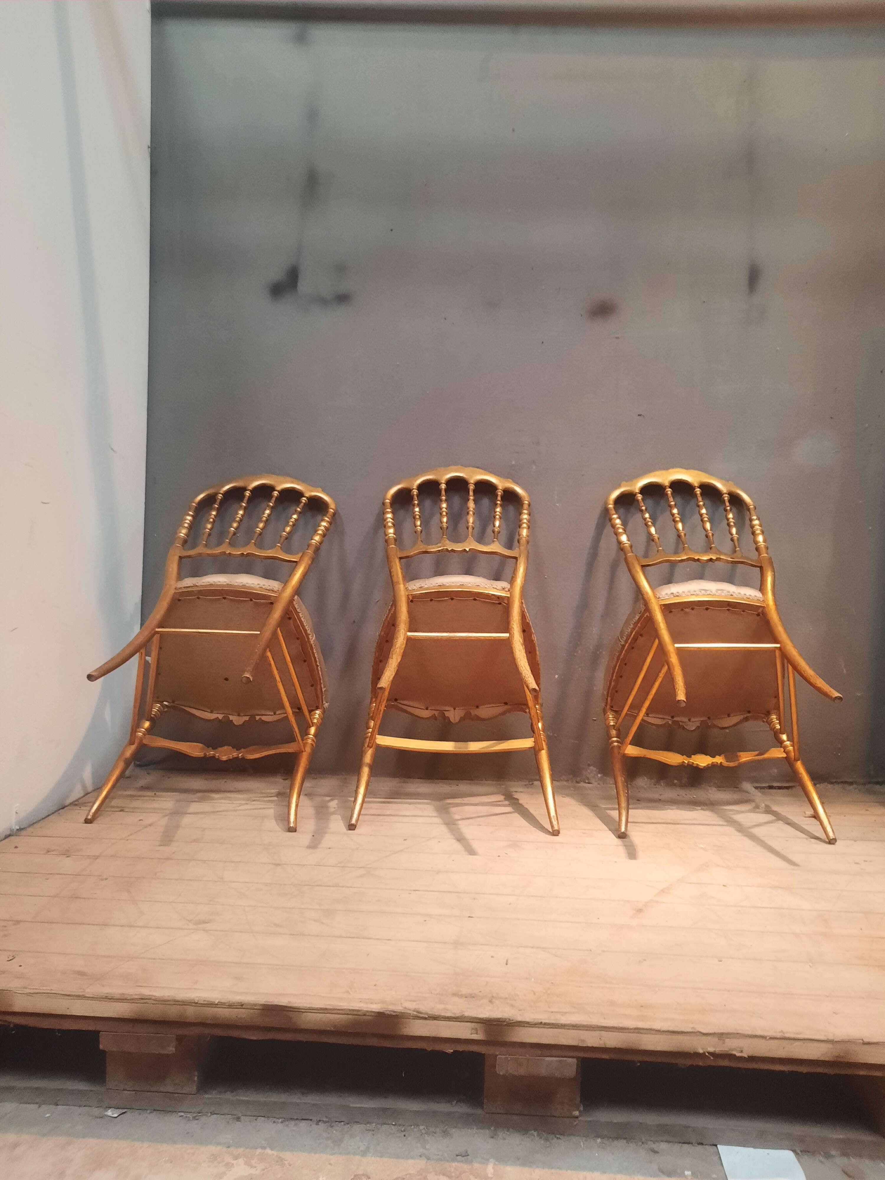 Set of 3 Napoleon III chairs in gilded wood