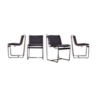 Set of four vintage chrome metal tube mid century chairs