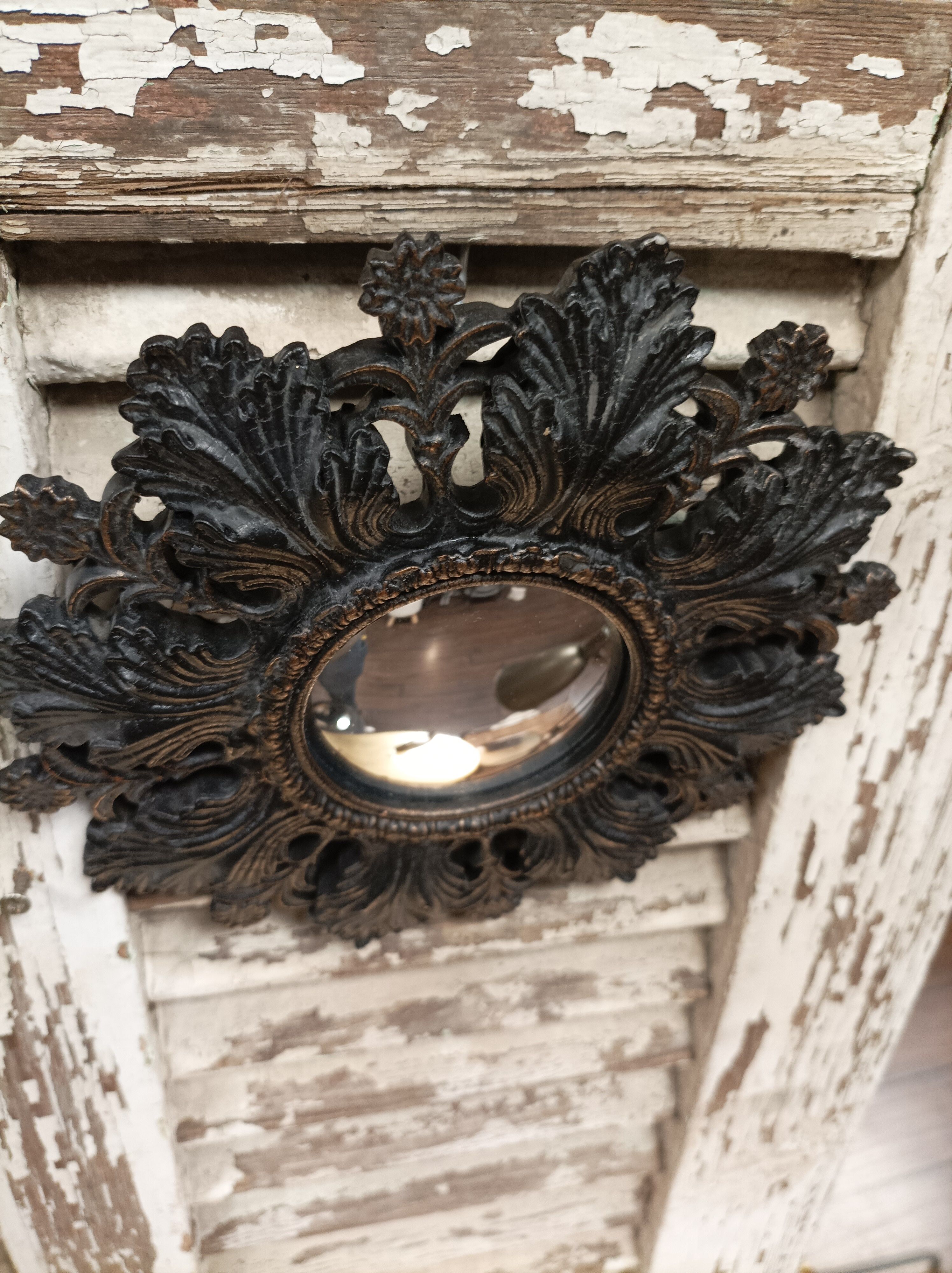 Convex mirror leaves and black flowers golden reflection 20 cm