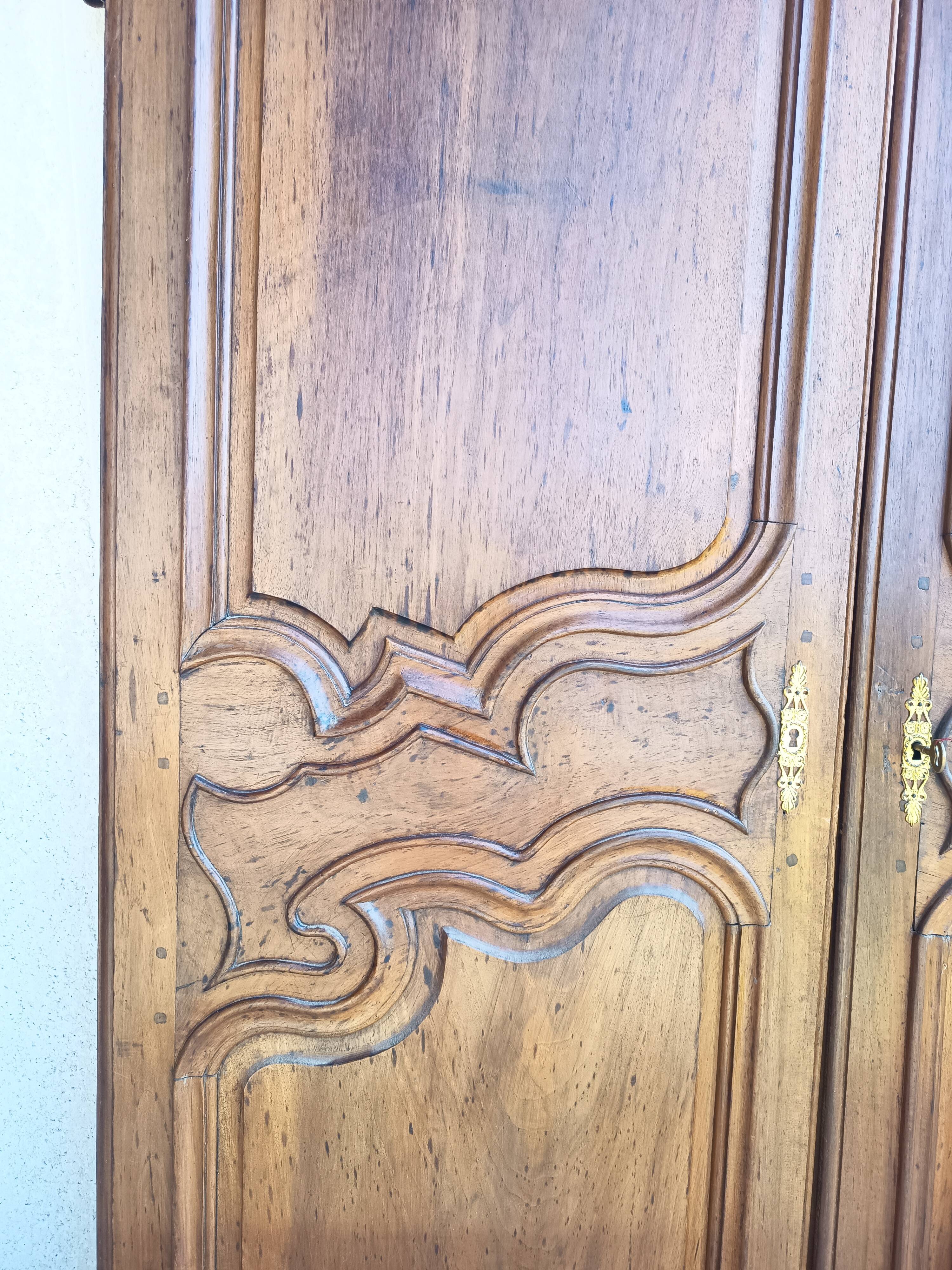 Louis XV walnut wardrobe doors