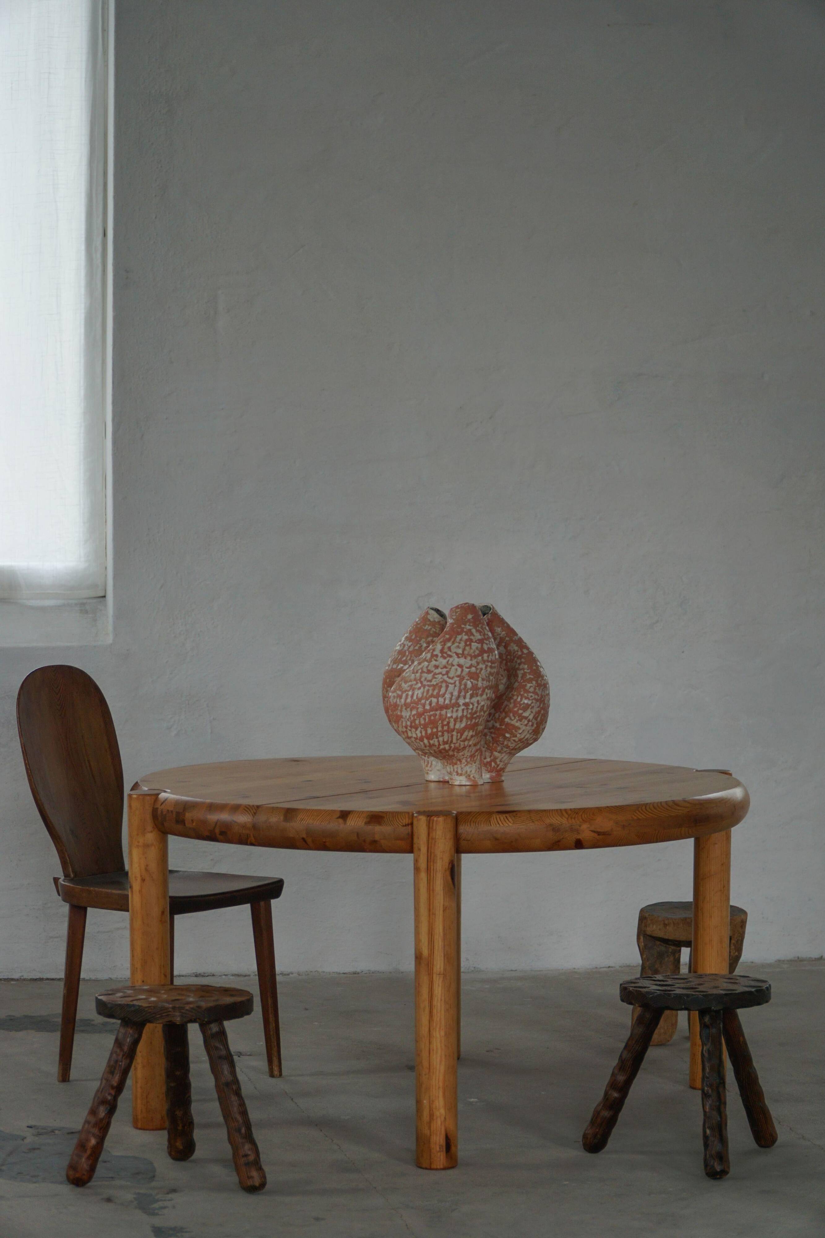 Rainer Daumiller, extendable round dining table in pine, modern Danish style, 1970s.