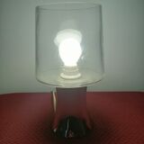 Table lamp, chrome glass stand and transparent glass globe.