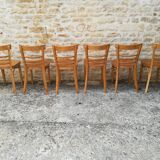 12 varnished bistro chairs