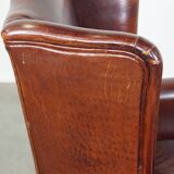 English style sheepskin leather wingback chair in a cognac color