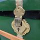 Green metal trunk with wooden sleds
