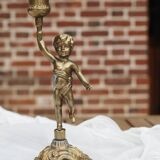 2 bougeoirs anciens chérubin en laiton