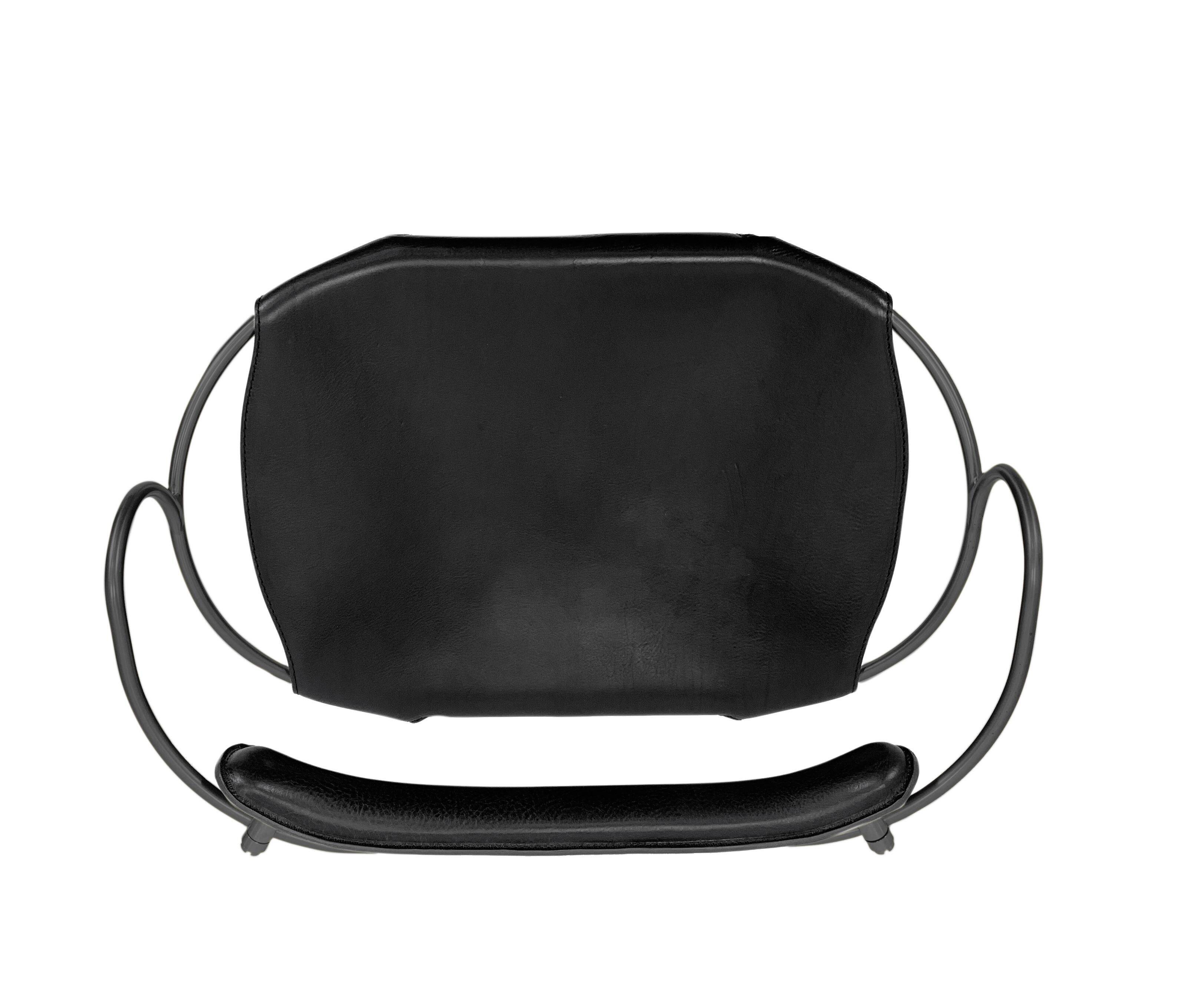 Contemporary sculptural bar stool c. Black smoked metal backrest and black leather.
