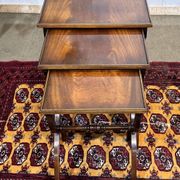 Set of English nesting tables in mahogany from the 1950s.