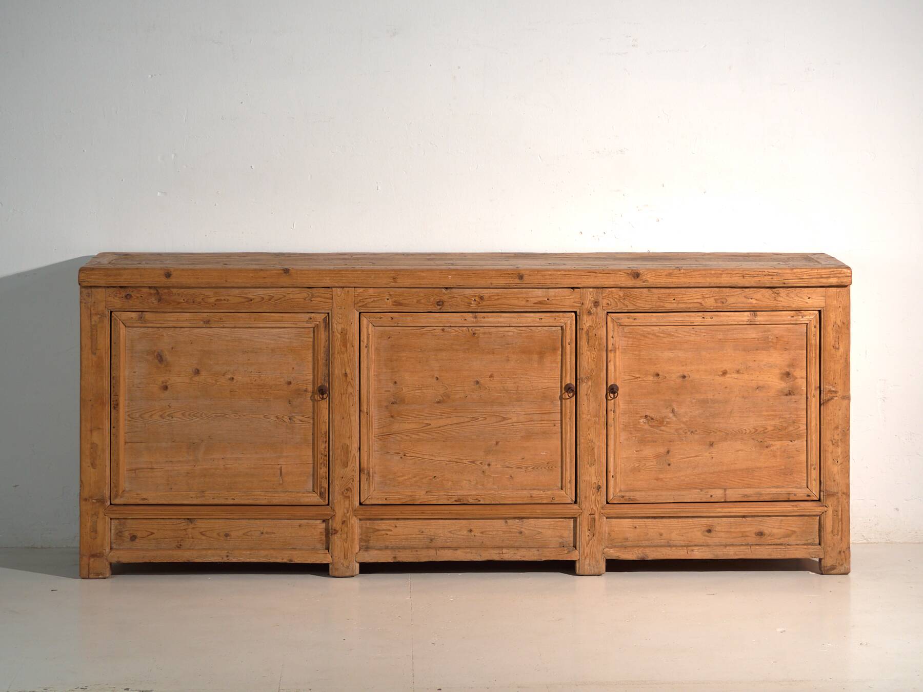 Antique wooden sideboard with three doors (circa 1920)