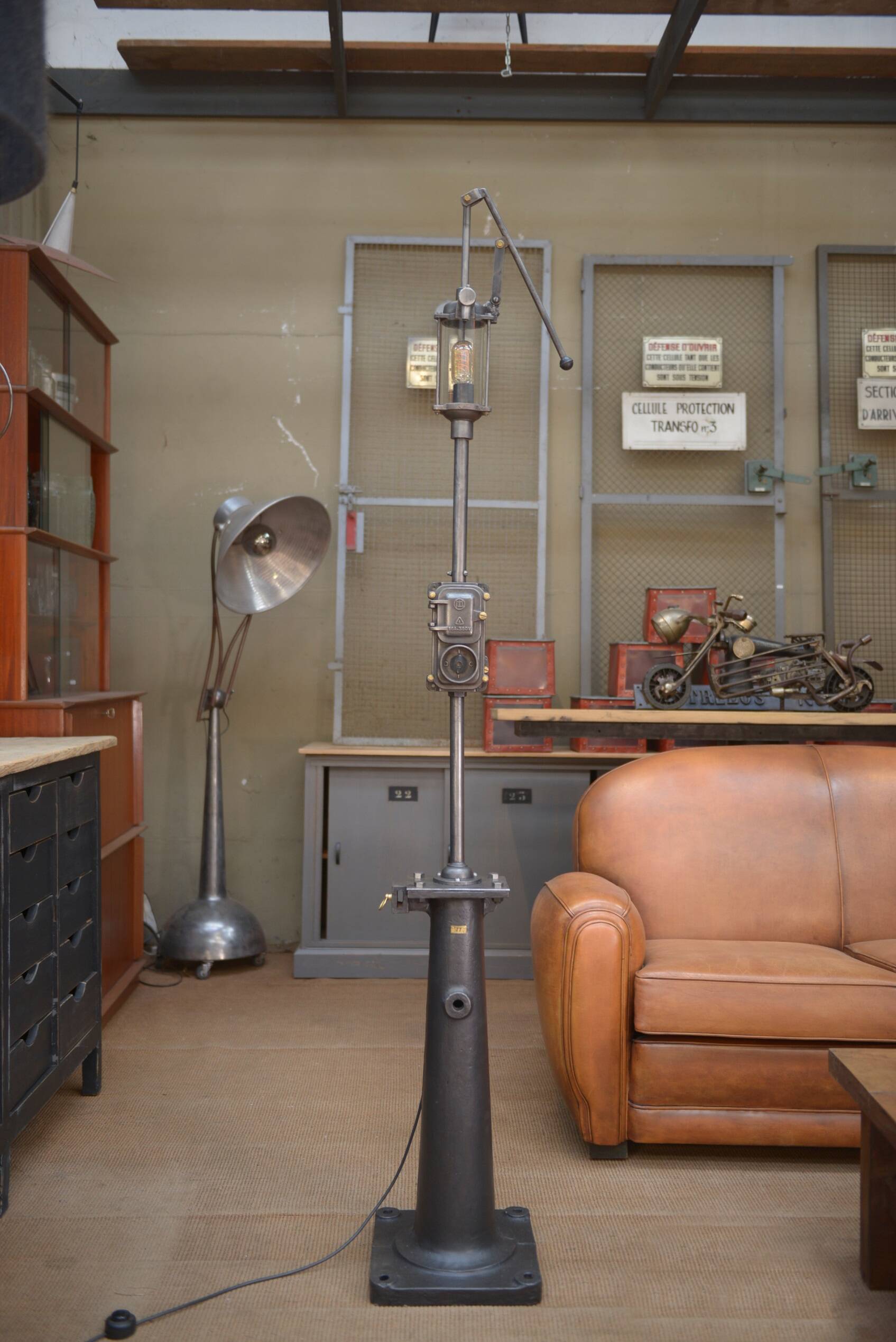 Old gas pump floor lamp in cast iron metal and glass 1930