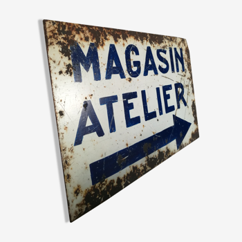 Ancienne plaque de magasin en tôle épaisse